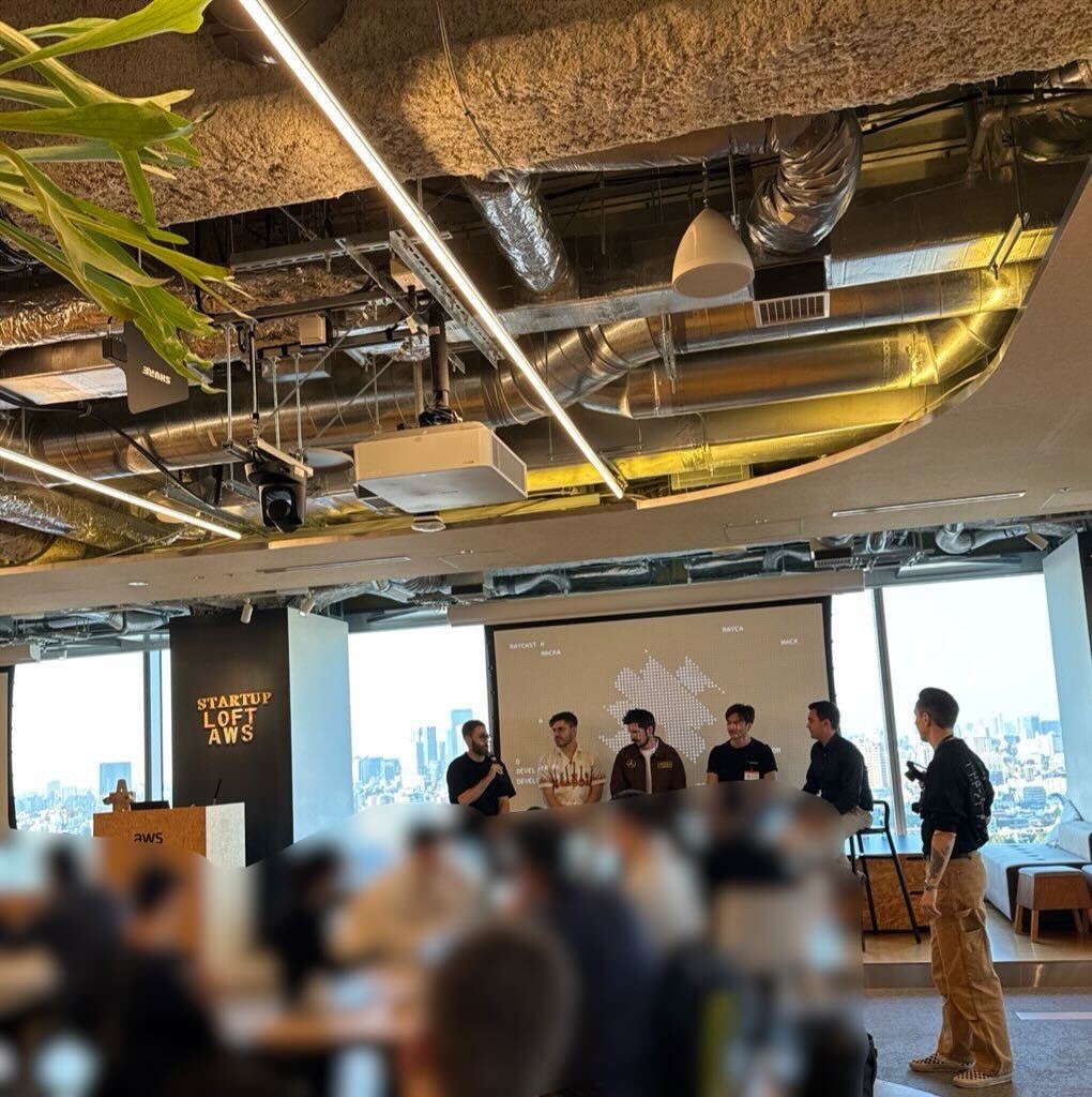 Participants working at the Tokyo AI Hackathon